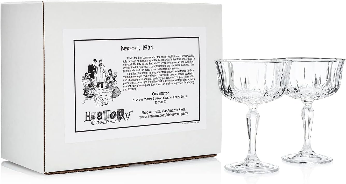 Newport "Social Season" Crystal Cocktail Coupe Glass, Vintage-Inspired 2-Piece Set in Gift Box – HISTORY COMPANY. Elegant coupe glasses with a timeless design, perfect for classic cocktails and refined entertaining. Crafted from fine crystal, these glasses evoke the sophistication of Newport's storied social scene.