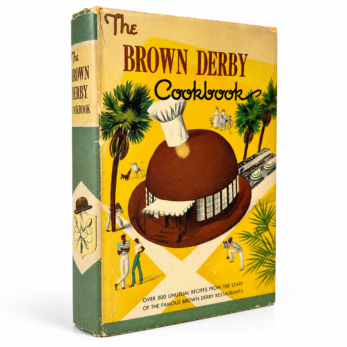 Vintage The Brown Derby Cookbook hardcover featuring the original illustrated yellow dust jacket, iconic Brown Derby restaurant, and over 500 recipes from the famous Hollywood restaurants.